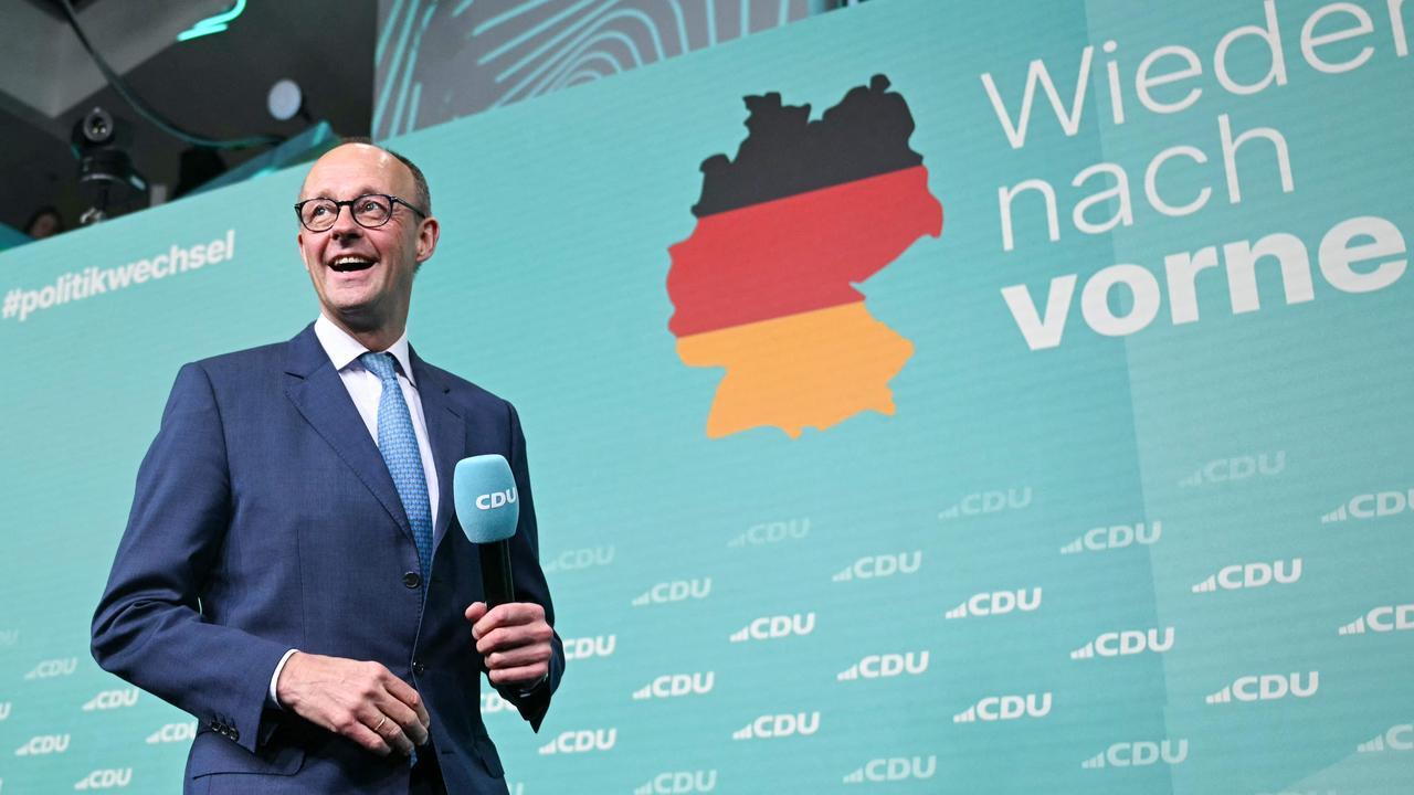 Friedrich Merz arrives to address supporters after the first exit polls in the German general elections were announced on TV during the electoral evening in Berlin on February 23, 2025. Picture: AFP.