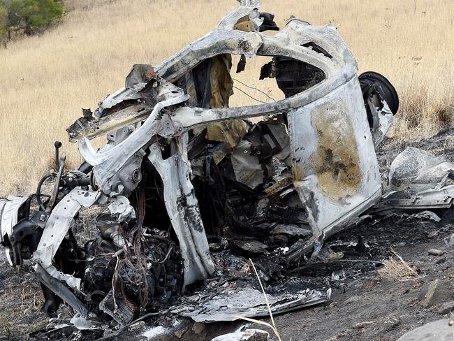 The wreckage from the car that ploughed off the EJ Whitten Bridge. Picture: Nicole Garmston