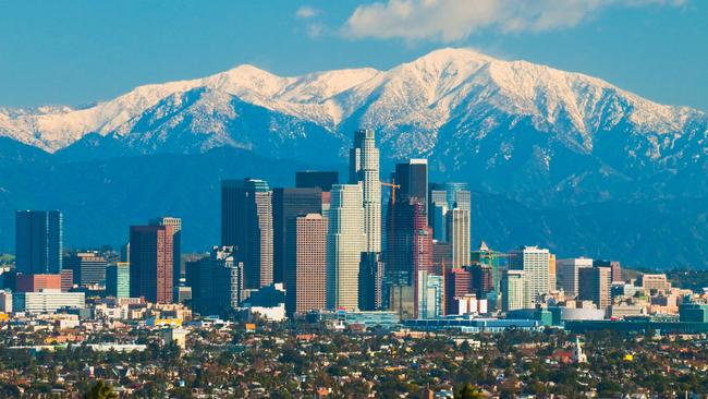 Downtown Los Angeles skyline with the snow-capped San Gabriel Mountains in the background. Picture: iStock