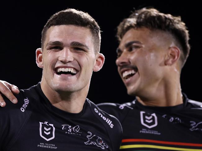 SYDNEY, AUSTRALIA - AUGUST 21: Tyrone May, Nathan Cleary and Daine Laurie of the Panthers celebrate after winning the round 15 NRL match between the Penrith Panthers and the Cronulla Sharks at Panthers Stadium on August 21, 2020 in Sydney, Australia. (Photo by Mark Kolbe/Getty Images)