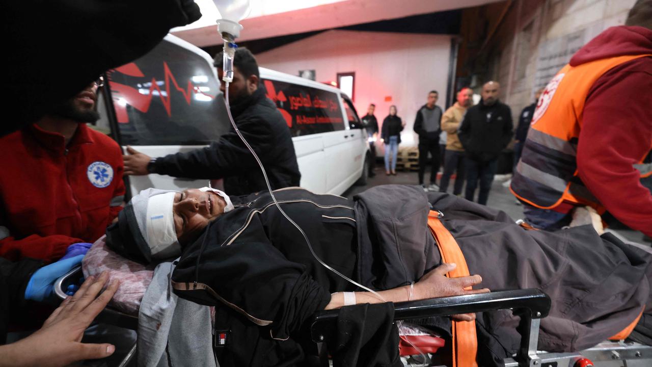 A wounded Palestinian man arrives for treatment for injuries sustained in clashes with Israeli settlers in the village of Mughayir, at a hospital in Ramallah in the occupied West Bank.Picture: AFP