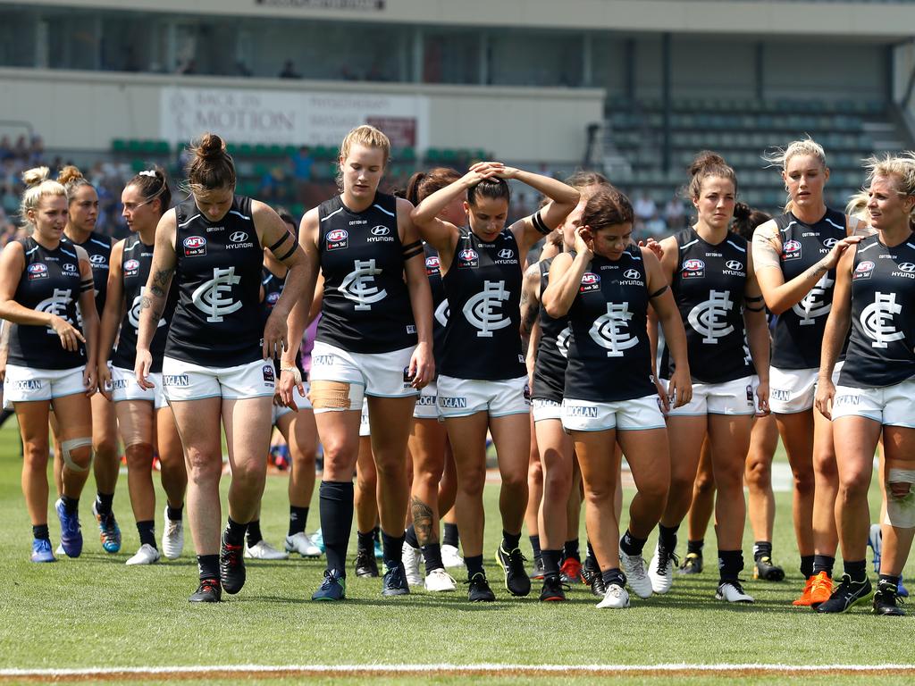 Blues players looking dejected after their loss in the AFLW Round 1 match at North Hobart Oval. Picture: Adam Trafford/AFL Media/Getty Images