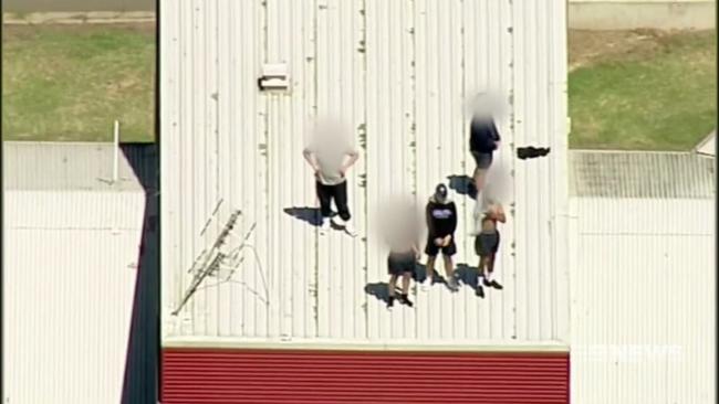 Rioters on the roof of Malmsbury Youth Justice Centre.