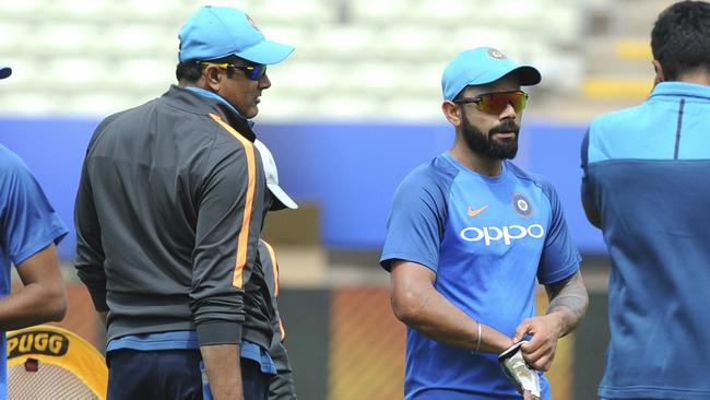 India captain Virat Kohli (R) has denied talk of a rift with coach Anil Kumble (L).