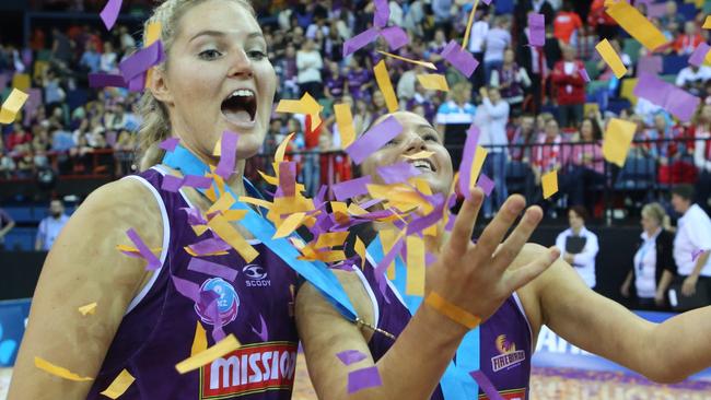 Gretel Tippett and Kimberley Ravaillion after the Firebirds Trans-tasman championship win in 2015. Photo: Jono Searle.