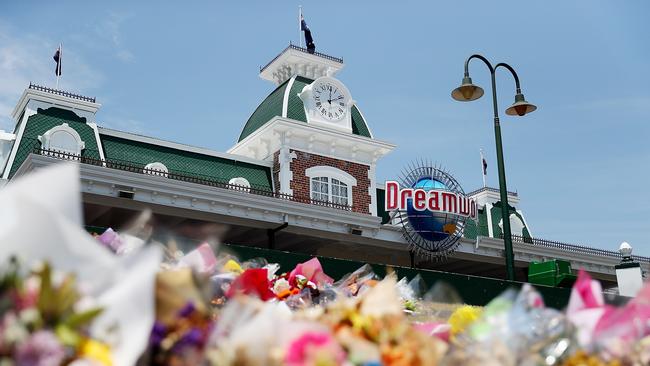 Flowers at the front of Dreamworld following the Thunder River Rapids ride disaster. Picture: Getty Images