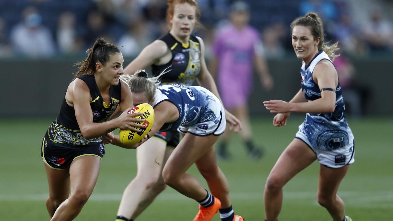 Richmond’s Monique Conti in full flight against the Cats on Friday night. Picture: Darrian Traynor/Getty Images