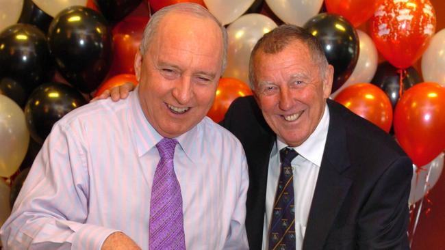 Alan Jones, left, celebrates with John Singleton in 2006. Picture: Frank Violi 