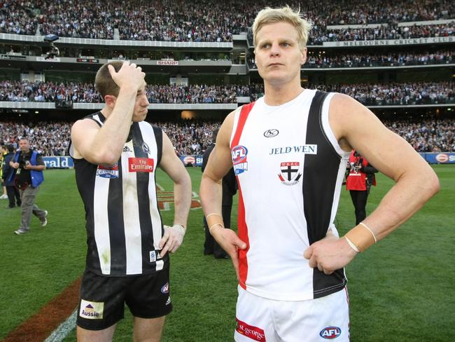 Pie captain Nick Maxwell and Nick Riewoldt after the Saints and Pies Grand Final draw in 2010.