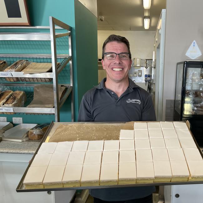 Troy Mulder, manager of the Bridgewater Bakery, Bath Lane Bendigo, with a tray of award-winning vanilla slice. Picture: Julieanne Strachan