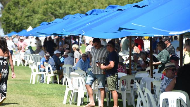 Many racegoers find shade during a sunny day at Moama Bowling Club Echuca Cup. Picture: David Smith