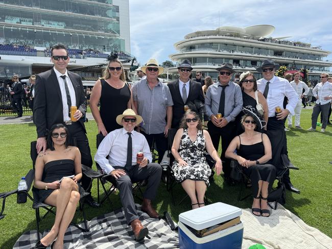 V B, Mark Evans, Glenn Jeffery, Rach Jeffery, Les Dean, Joanne Dean, Marc Dean, Ross Reddrop, Melissa Davies, Kerryanne Reddrop and Paul Davies at Flemington for Derby Day on November 2, 2024. Picture: Phillippa Butt