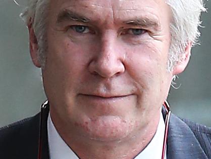 Fair Work Vice President and Kathy Jackson's partner Michael Lawler arrives at the Federal court in Sydney alone.