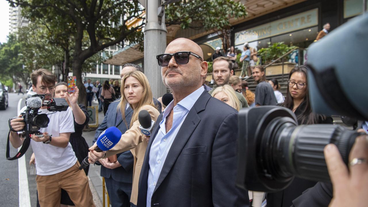 Alan Yazbek left court surrounded by media. Picture: NewsWire / Simon Bullard.