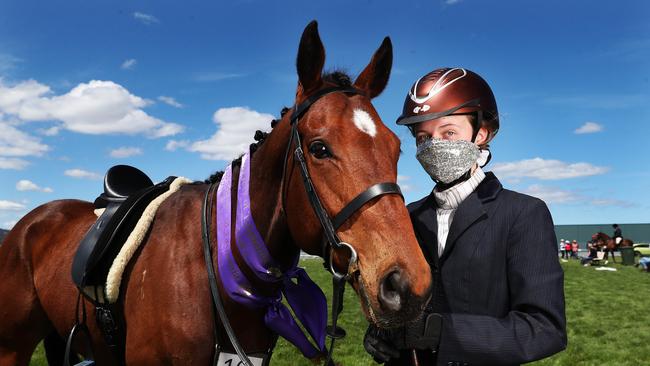 Emily Jones 15 of Oatlands with horse Batchelor Baron after competing in equestrian events. Hobart Show 2021 day 1. Picture: Nikki Davis-Jones