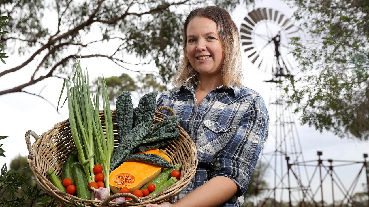 Hollie and her husband, Chris, are in charge of field-grown fruit and vegetable production, with a small shadecloth greenhouse for raising seedlings. Picture: Yuri Kouzmin