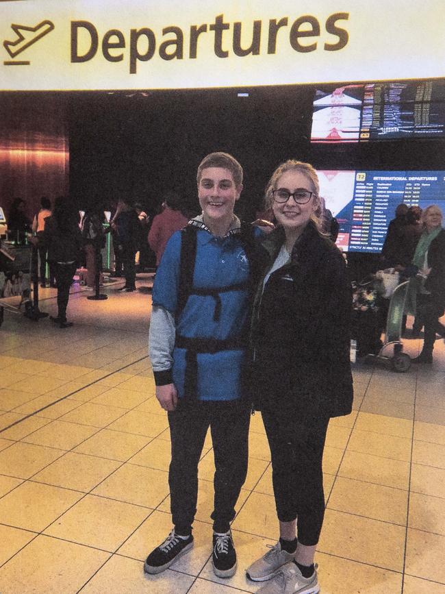 Timothy, pictured with his sister at the airport, as he left on his big trip in 2019.