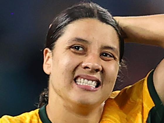 SYDNEY, AUSTRALIA - AUGUST 16: Sam Kerr of Australia looks dejected after the team's 1-3 defeat and elimination from the tournament following the FIFA Women's World Cup Australia & New Zealand 2023 Semi Final match between Australia and England at Stadium Australia on August 16, 2023 in Sydney, Australia. (Photo by Brendon Thorne/Getty Images)