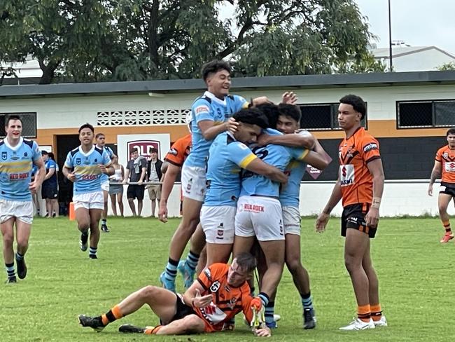 Norths celebrate a Meninga Cup try.