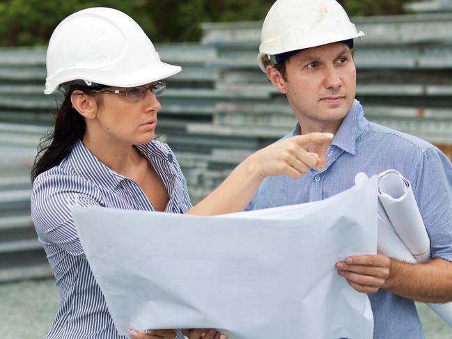 young engineer woman shows her co-worker around the site