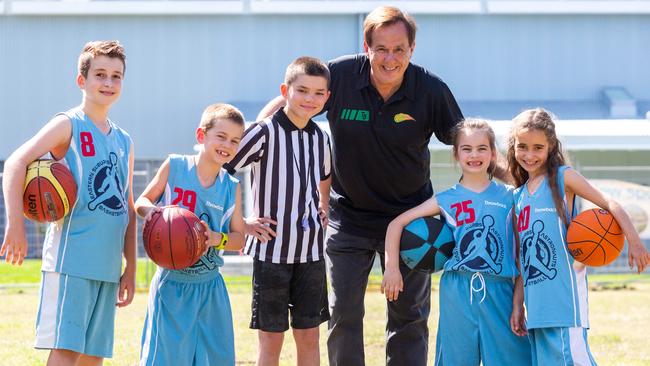 Lachlan Wheeler, Gus Ammit, Storm Turner, City of Sydney Basketball Association Director Robert Van Houten, Molly Ammit and Evangeline Wheeler outside the new basketball stadium at Perry Park in Alexandria. Picture: Jordan Shields.