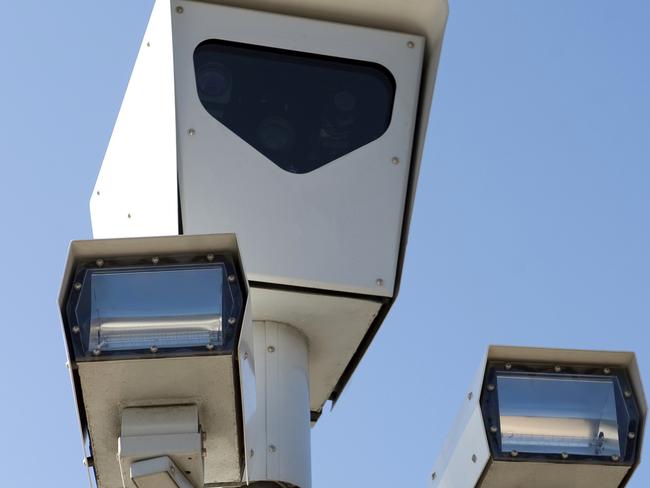 Speed camera against blue sky