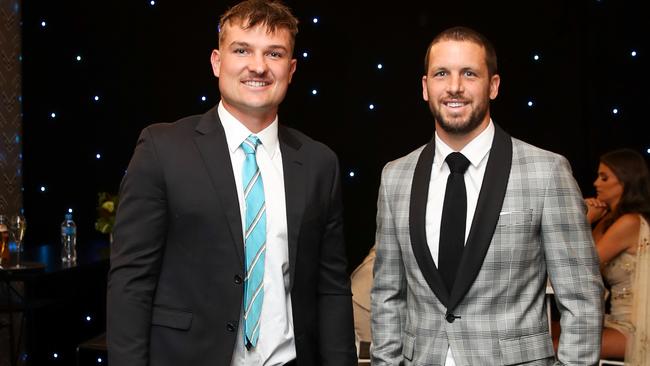 Ollie Wines and Travis Boak of Port Adelaide during the 2020 Brownlow Medal Count at Adelaide Oval. Picture: Matt Turner / AFL Photos via Getty Images