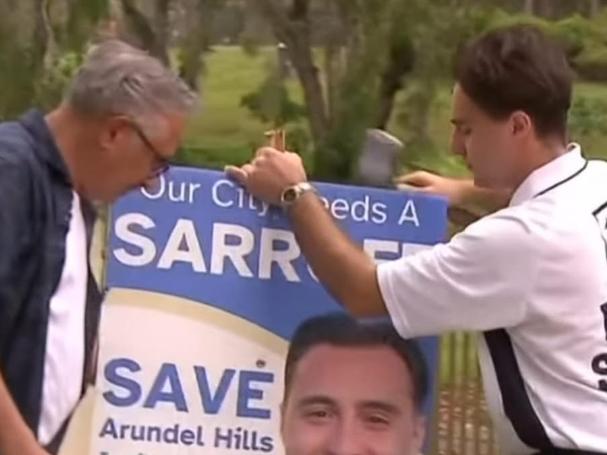 Eddy Sarroff and son Edward on the campaign trail. Pic by Seven News Gold Coast.