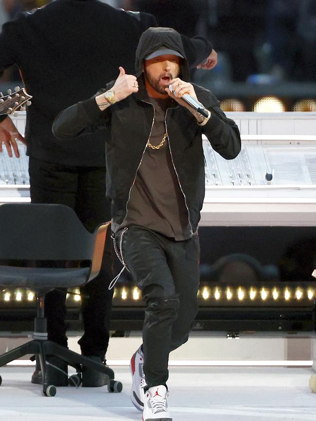 Eminem rocks the mic. (Photo by Ronald Martinez/Getty Images)