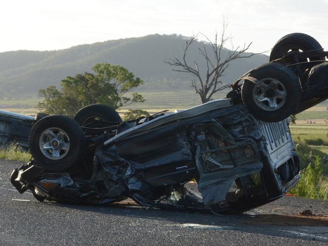 The occupants of this upturned vehicle escaped serious injuries following a horror crash on the Cunningham Highway at Gladfield late last year. (Photo: Michael Nolan)