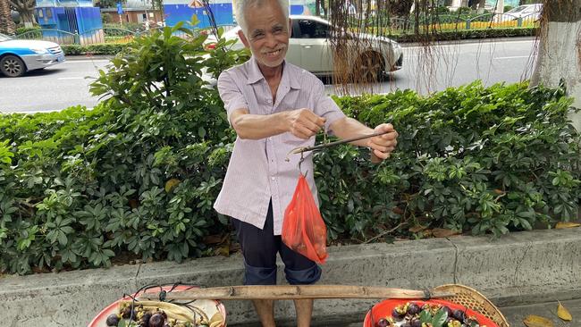 Mr Chen, a sixty-something fruit seller in Xiamen, Fujian province, in China's south east. Picture: Will Glasgow