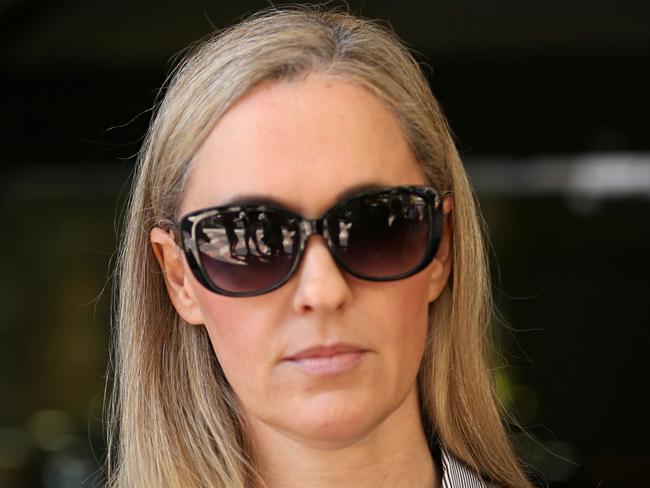 The not so social socialite Lisa Stockbridge facing serious drugs charges at the downing centre in Sydney today, leaves after it being adjurned and a none pub order slaped on it  .pic John grainger