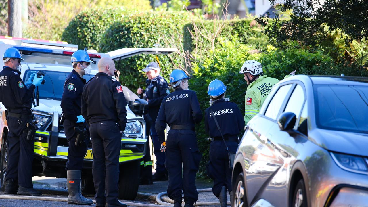 Investigators quickly established a crime scene after the body of a person was located inside the home. Photo: NewsWire / Gaye Gerard