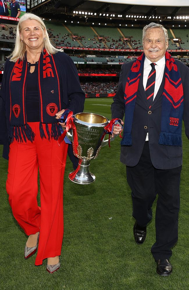 Ron Barassi joined Melbourne president Kate Roffey to carry the 2021 premiership cup around the MCG at the beginning of the 2022 season. Picture: Michael Klein