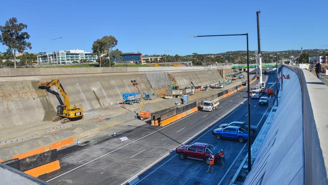 One side of the highway is ready to open to traffic but work is beginning to start to repair the collapsed sections on the other side. Picture: Brenton Edwards