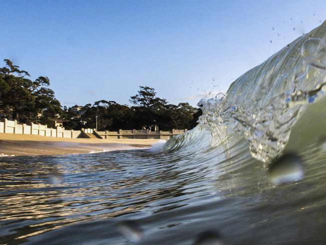 A wave rolls in to Balmoral. Picture: Chris Meredith