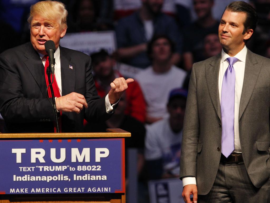 Donald Trump (L) introduces his son Donald Trump Jr at a campaign rally. Picture: Getty