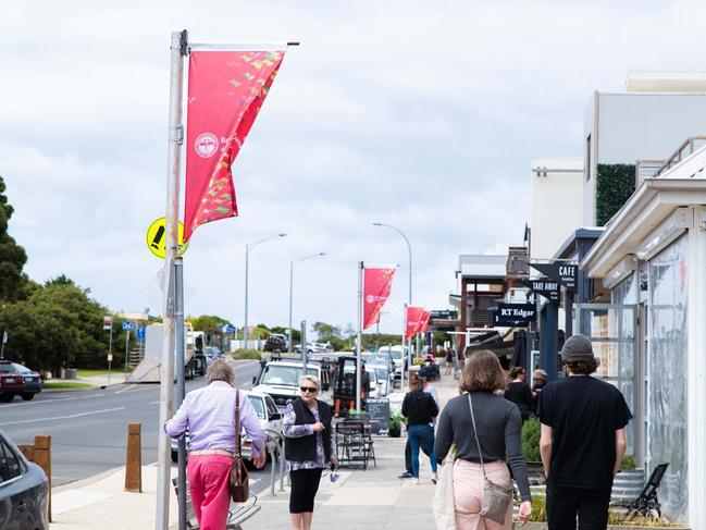 The Borough of Queenscliffe installed new Christmas flag decorations in Queenscliff and Point Lonsdale this week to bring “a bit of seasonal cheer to the streets”. Picture: supplied.