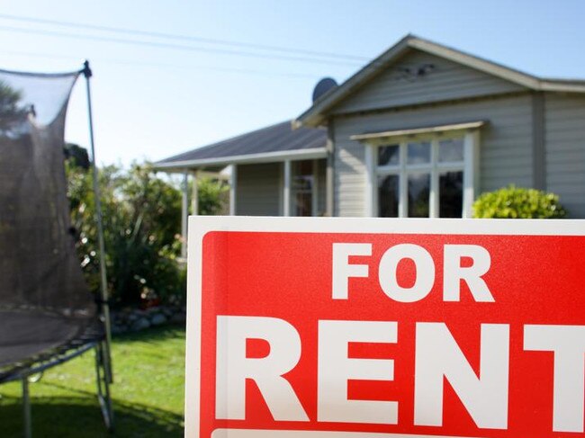 A For Rent Sign Outside a House.