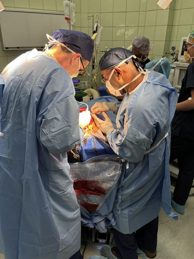 Dr Tait and Dr Alani performing surgery at the National Referral Hospital, Honiara. Picture: Evan Hughes