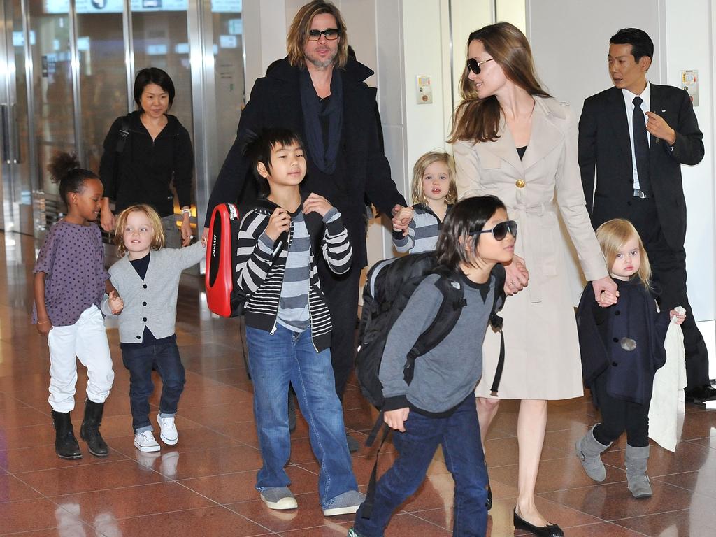 The couple’s jetsetting lifestyle with their small children was frequently documented at the time, seen here in Tokyo in 2011. Picture: Jun Sato/WireImage