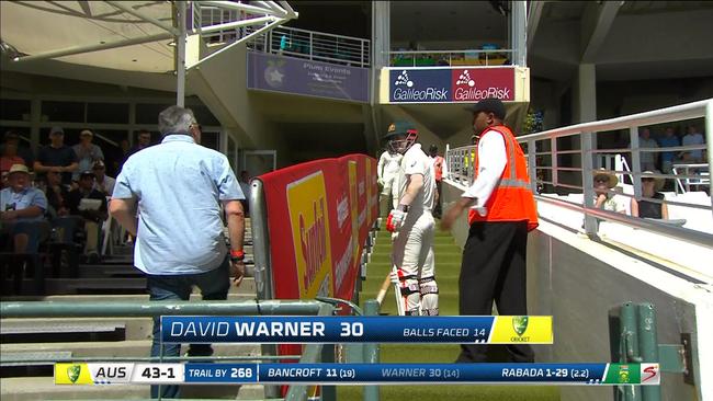 Warner involved in another heated clash, this time with a fan.