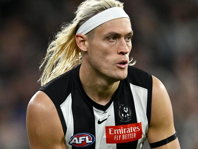 MELBOURNE, AUSTRALIA - SEPTEMBER 22: Darcy Moore of the Magpies shapes to kick during the AFL First Preliminary Final match between Collingwood Magpies and Greater Western Sydney Giants at Melbourne Cricket Ground, on September 22, 2023, in Melbourne, Australia. (Photo by Quinn Rooney/Getty Images)