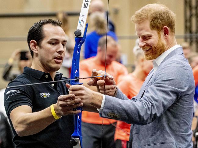 Prince Harry tries archery during the presentation of the Invictus Games The Hague 2020, in The Hague, Netherlands, during 2019. Picture: Patrick van Katwijk/AFP