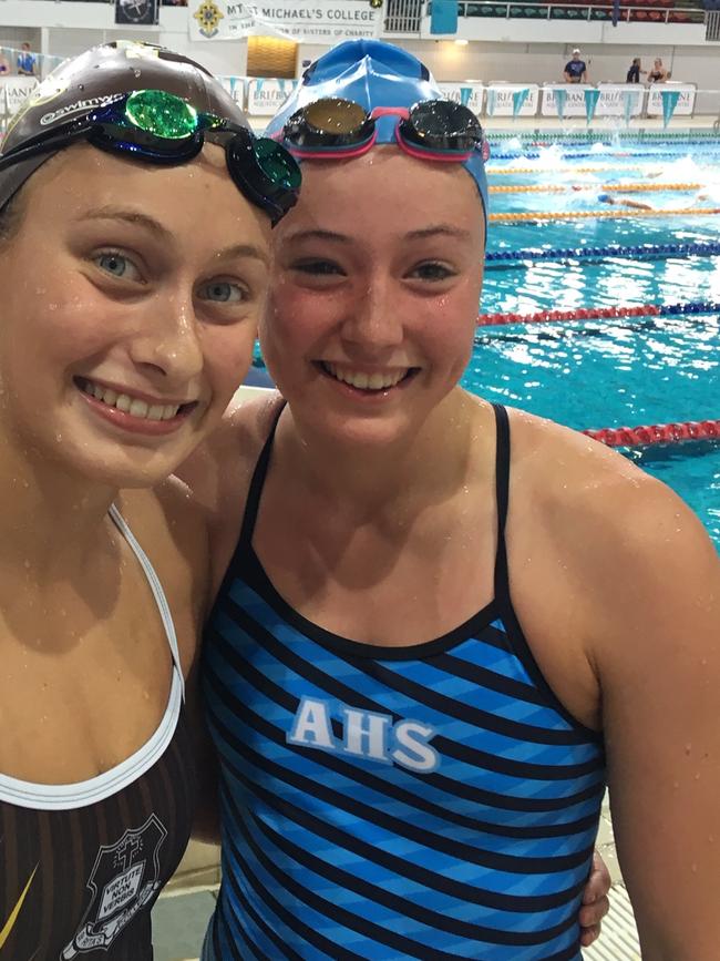 Bronte Job, right, after claiming a record in the 16 years 50m freestyle at this year’s CaSSSA Cup.