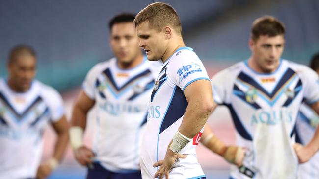 SYDNEY, AUSTRALIA - JUNE 16:  Dale Copley of the Titans and his team mates look dejected after a Rabbitohs try during the round 15 NRL match between the South Sydney Rabbitohs and the Gold Coast Titans at ANZ Stadium on June 16, 2017 in Sydney, Australia.  (Photo by Mark Kolbe/Getty Images)