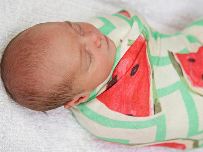 A close up shot of one-week-old Georgie Ferguson, who was born at the Manly Life Saving Club's public toilets. Picture: Adam Yip