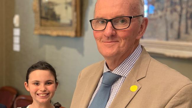 NSW Grandparent of the Year, Robert Stark, with his granddaughter Ruby, 9, at Parliament House to receive his award. Picture: Supplied