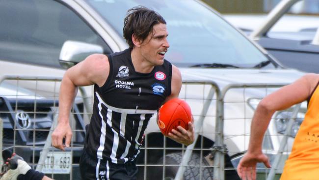 Former Western Bulldogs captain Ryan Griffen, left, returns to his hometown to play for boyhood club Goolwa/Port Elliot Magpies against Langhorne Creek at Goolwa Oval in his first match since retiring from the AFL, Saturday, July 27, 2019. (Pic: AAP/Brenton Edwards)