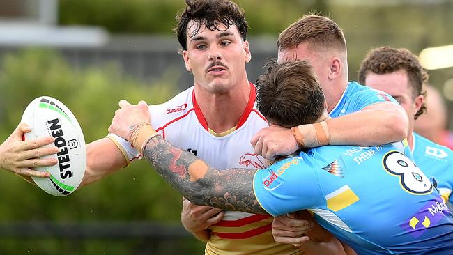 SUNSHINE COAST, AUSTRALIA - FEBRUARY 18: Herbie Farnworth of the Dolphins looks to offload during the NRL Pre-season challenge match between the Dolphins and Gold Coast Titans at Sunshine Coast Stadium on February 18, 2024 in Sunshine Coast, Australia. (Photo by Bradley Kanaris/Getty Images)